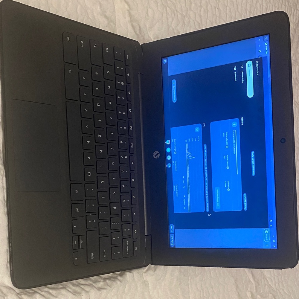 HP Black Laptop with Blue Screen Display